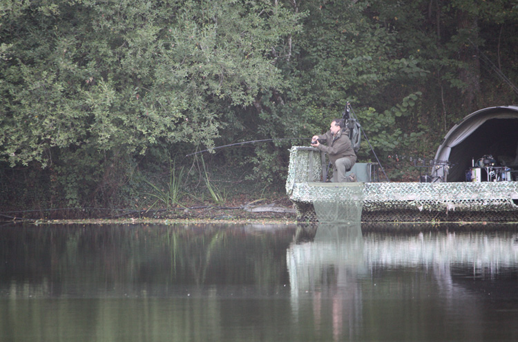 Shaun Harrison playing a carp at Quarry Bank Fishery, France