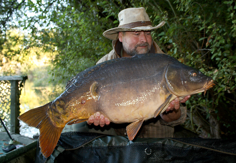 Shaun Harrison with a carp from Quarry Bank Fishery, France