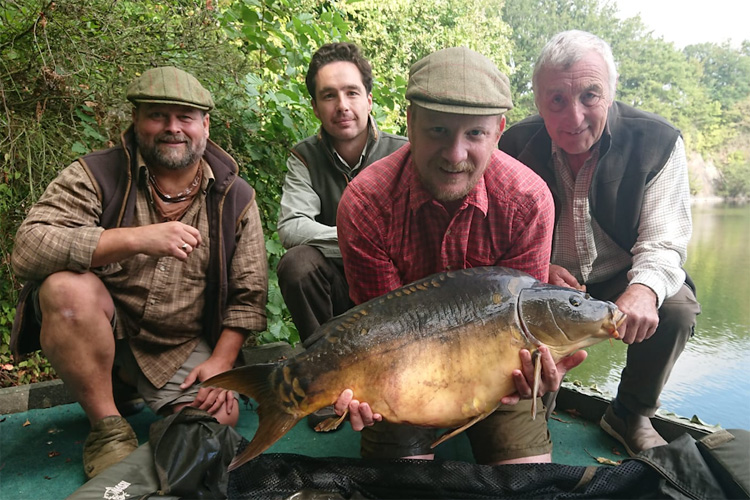 Shaun Harrison, Tim Pike, Fennel Hudson and Neil Shipman at Quarry Bank Fishery, France