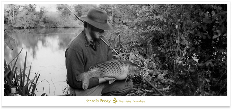 Redmire Pool 18lb common caught on 1lb line and a size 18 hook.